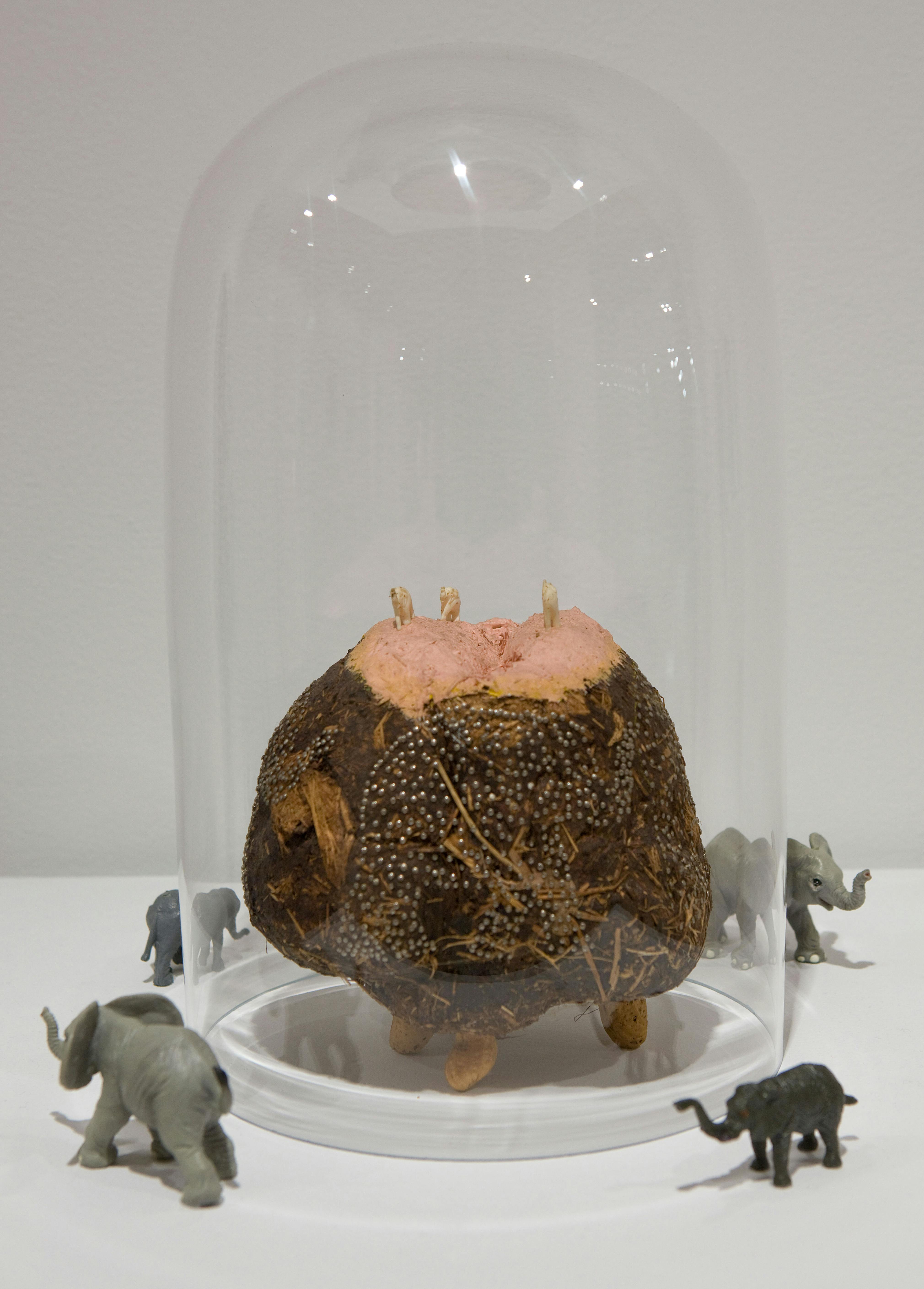 David Hammons
Untitled, 1978
Painted dung, pins, peanut shells, ivory elephants, plastic toy elephants, glass jar, 12 x 10 in.
Collection of Hudgins Family
Courtesy Jack Tilton Gallery, New York