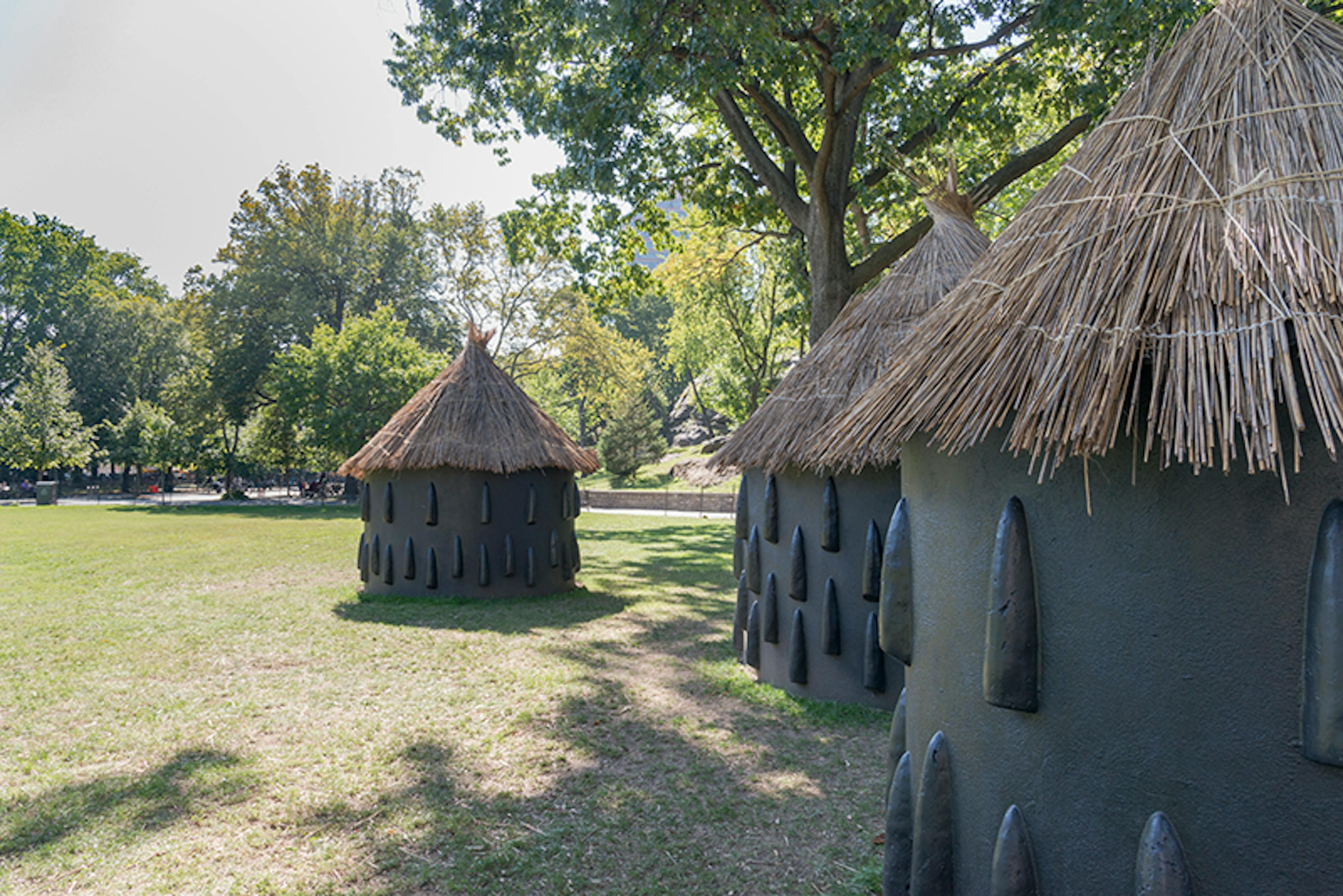 A particularly elaborate imba yokubikira, or kitchen house, stands locked up while its owners live in diaspora (Installation View), 2016. 
Marcus Garvey Park, New York, NY, August 25, 2016–July 25, 2017. 
Photo: Adam Reich