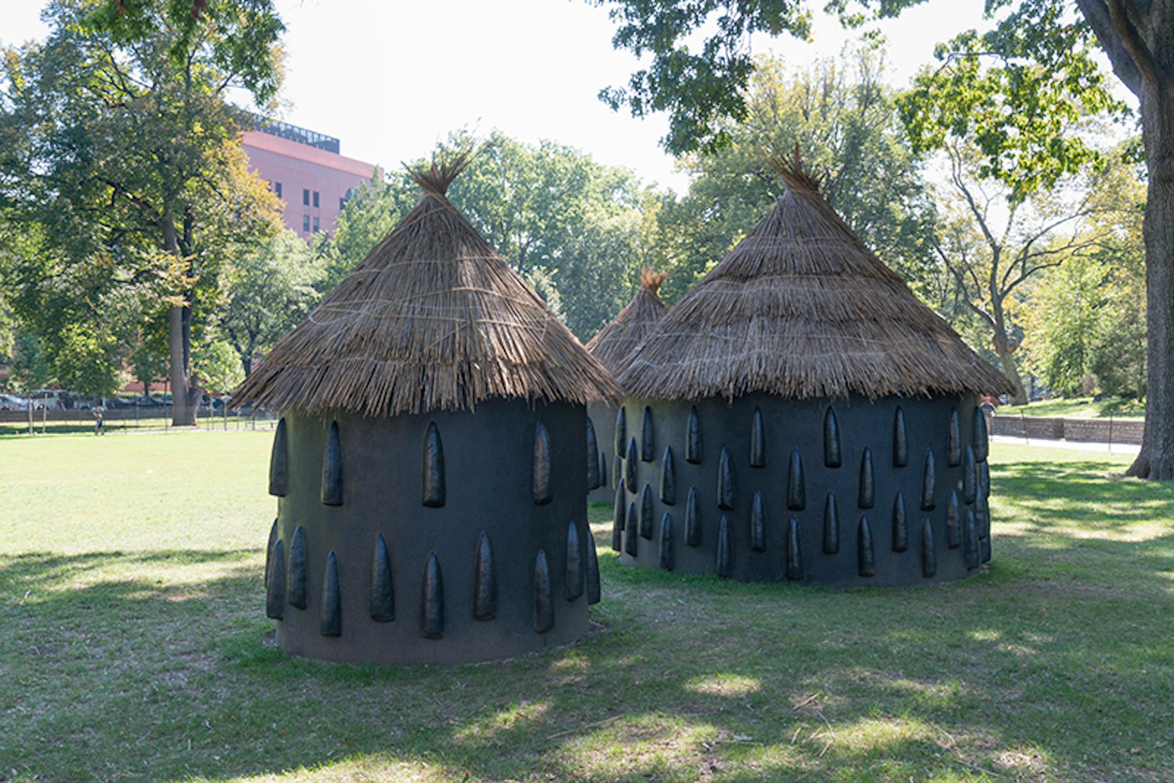 A particularly elaborate imba yokubikira, or kitchen house, stands locked up while its owners live in diaspora (Installation View), 2016. 
Marcus Garvey Park, New York, NY, August 25, 2016–July 25, 2017. 
Photo: Adam Reich