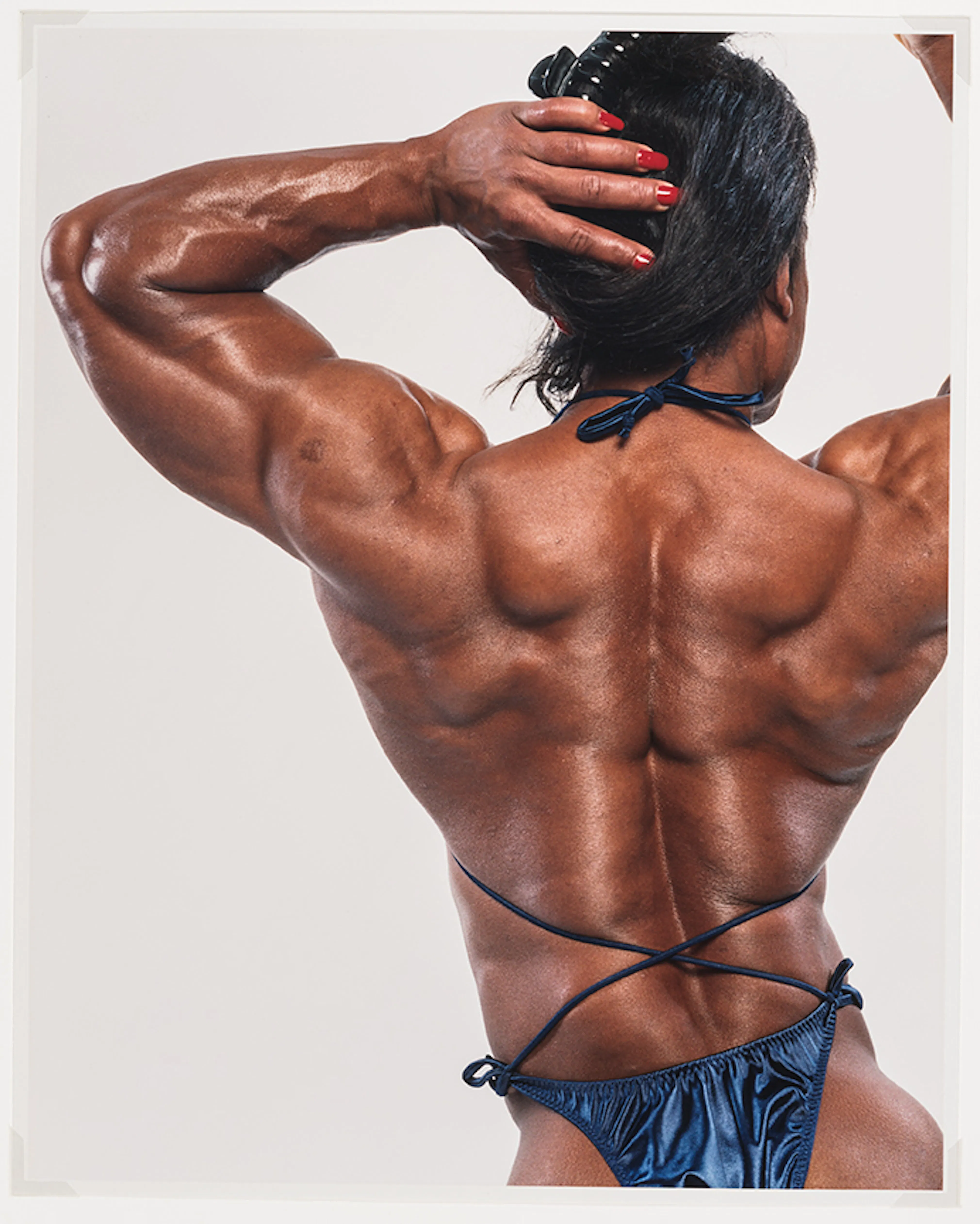 <p>Deborah Willis, <em>Bodybuilder #4</em>, 1998. Chromogenic print, 19 1/2 × 15 1/2 in. The Studio Museum in Harlem; gift of the artist 2005.2.1. Photo: Zalika Azim</p>