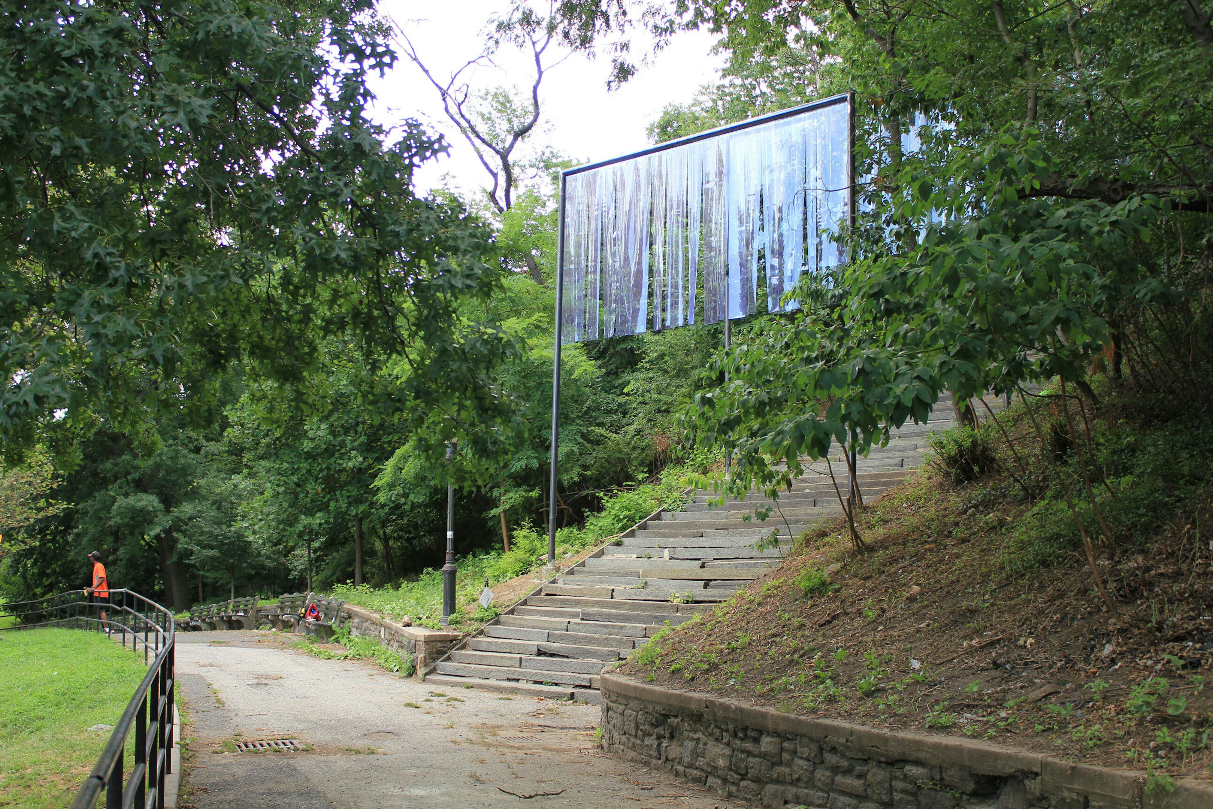 <p><strong><em>inHarlem: Kori Newkirk</em><br />August 25, 2016–July 25, 2017  <br />St. Nicholas Park</strong></p>
<p><br /></p>
<p>Kori Newkirk transformed one of the iconic sets of steps in St. Nicholas Park into the site of a ceremonial procession with<em> Sentra</em>, a towering installation of reflective fringe curtains and a dazzling canopy visible to passersby.</p>