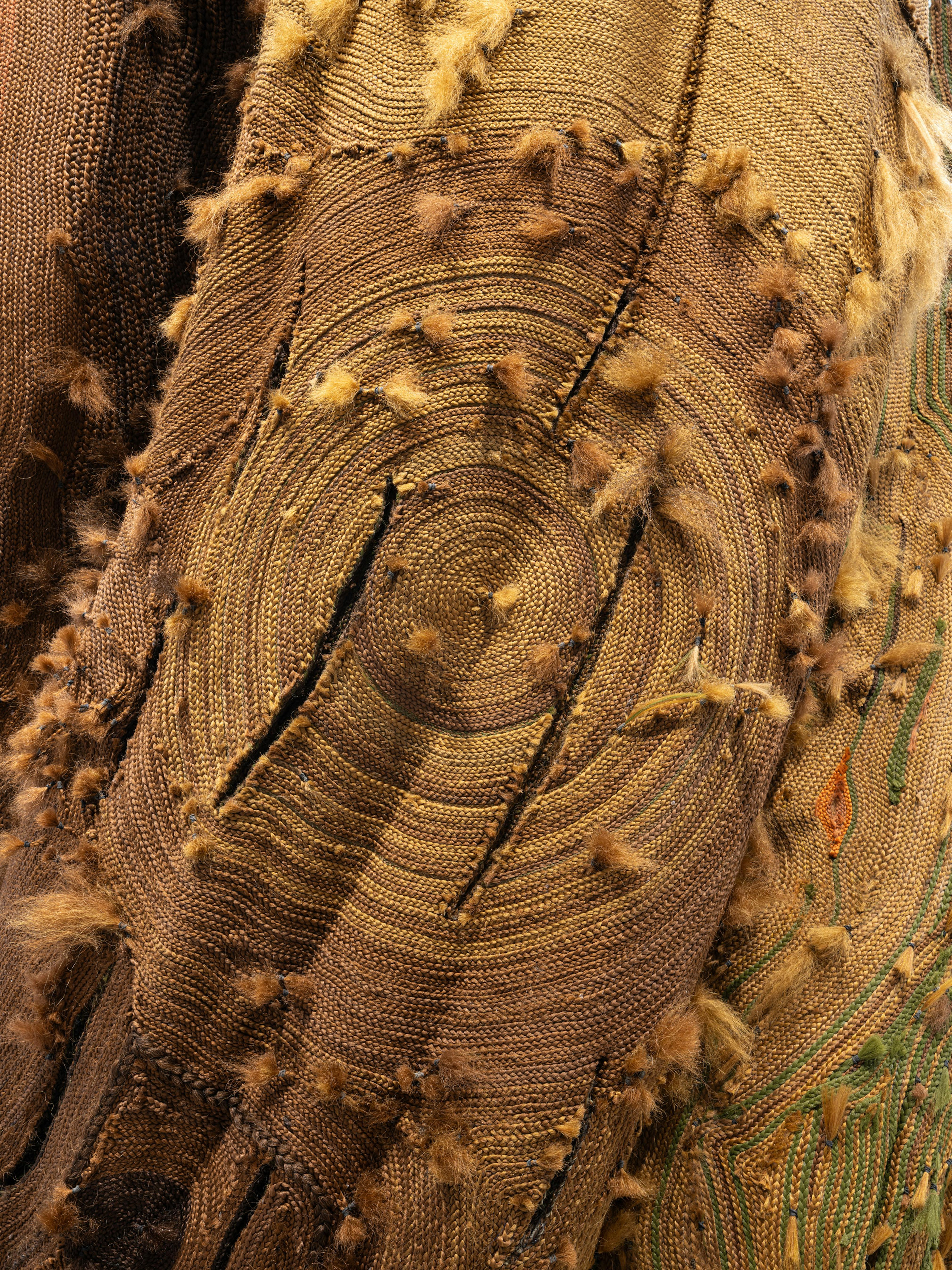 <p>Malcolm Peacock, <em>Five of them were hers and she carved shelters with windows into the backs of their skulls</em> (detail), 2024. Foam, cement-mix overlay, wood, synthetic hair, and six-channel audio (54 min., 38 sec., looped). Installation view of <em>P</em><em>ass Carry Hold: Studio Museum Artists in Residence 2023–24</em>, on view at MoMA PS1 from September 26, 2024 through February 10, 2025. Photo: Kris Graves</p>