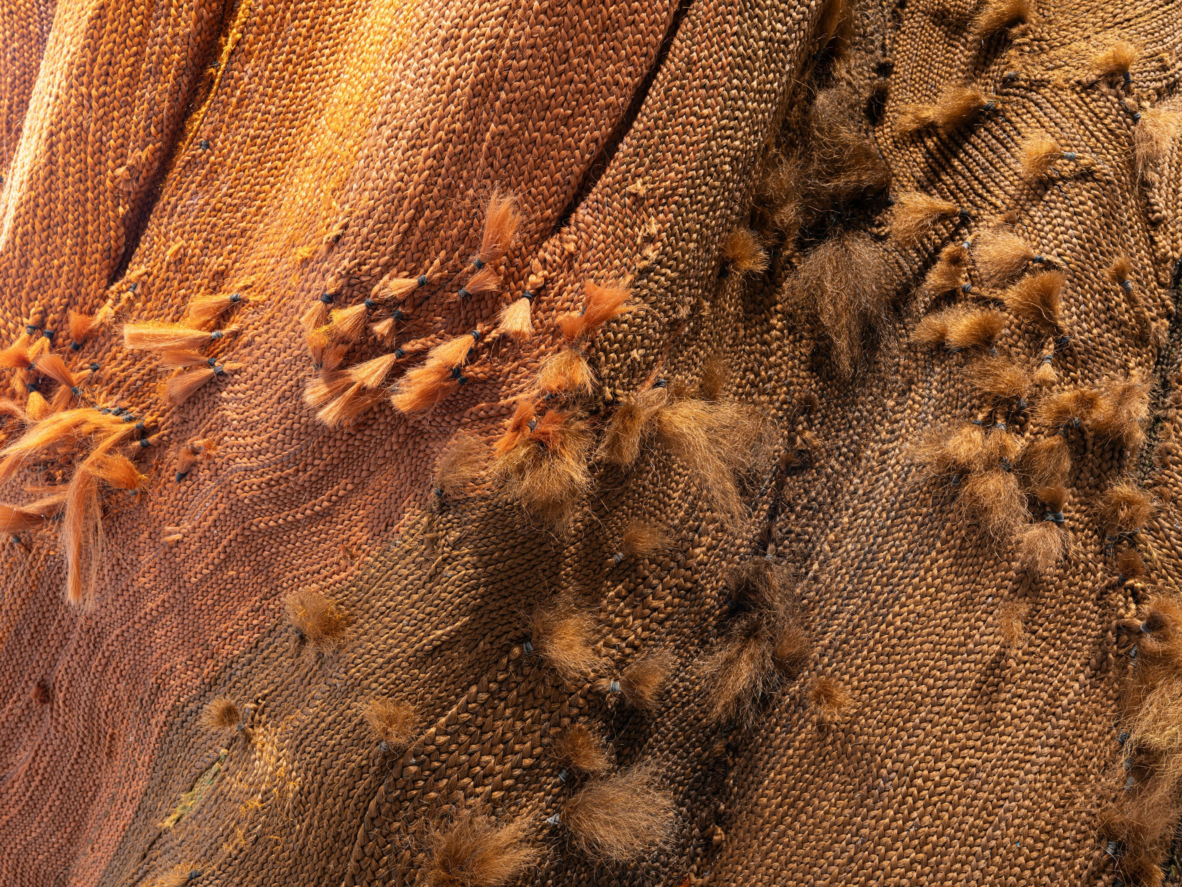 <p>Malcolm Peacock, <em>Five of them were hers and she carved shelters with windows into the backs of their skulls</em> (detail), 2024. Foam, cement-mix overlay, wood, synthetic hair, and six-channel audio (54 min., 38 sec., looped). Installation view of <em>Pass Carry Hold: Studio Museum Artists in Residence 2023–24</em>, on view at MoMA PS1 from September 26, 2024 through February 10, 2025. Photo: Kris Graves</p>