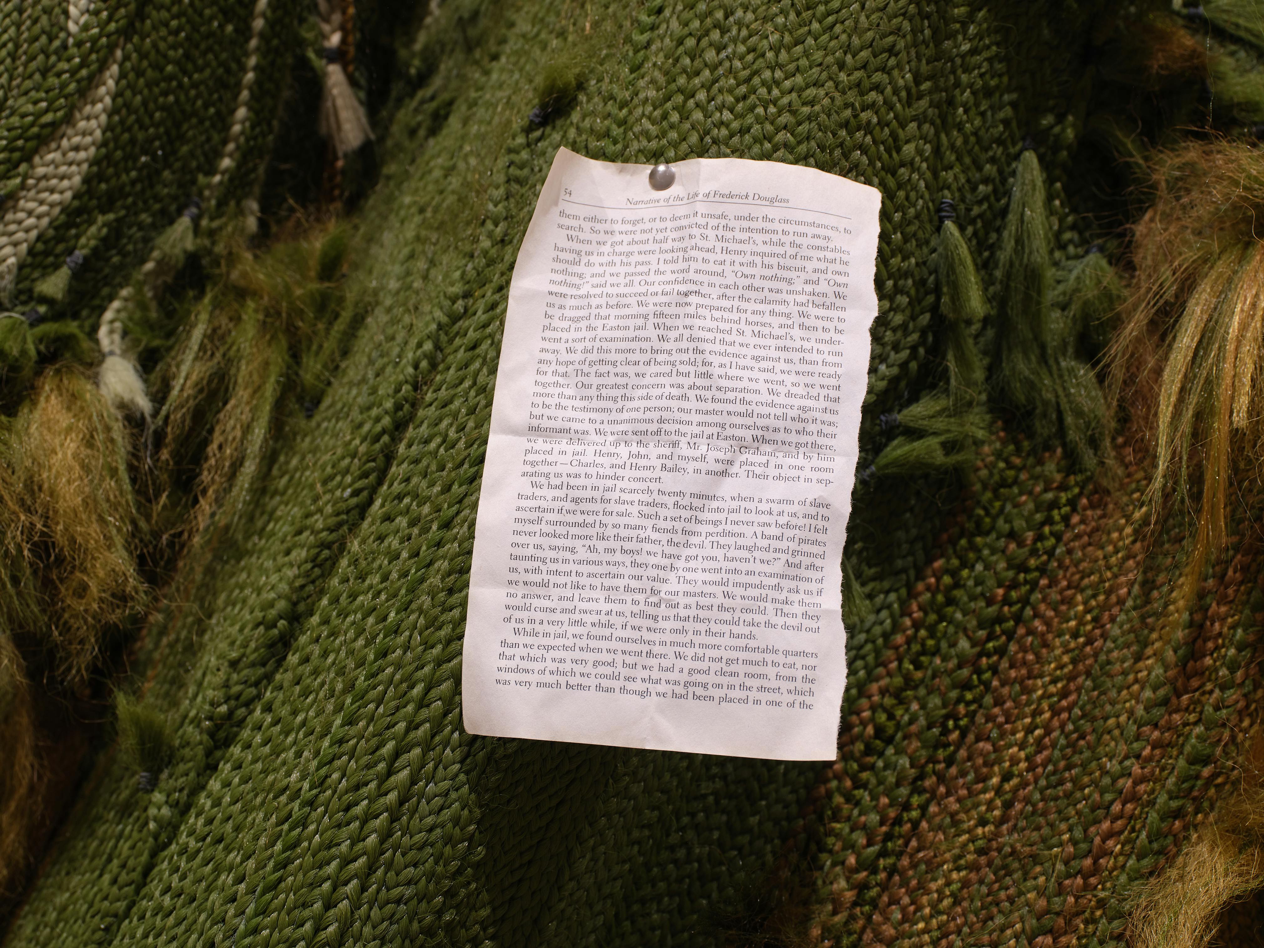 <p>Malcolm Peacock, <em>Five of them were hers and she carved shelters with windows into the backs of their skulls</em> (detail), 2024. Foam, cement-mix overlay, wood, synthetic hair, and six-channel audio (54 min., 38 sec., looped). Installation view of <em>Pass Carry Hold: Studio Museum Artists in Residence 2023–24</em>, on view at MoMA PS1 from September 26, 2024 through February 10, 2025. Photo: Kris Graves</p>