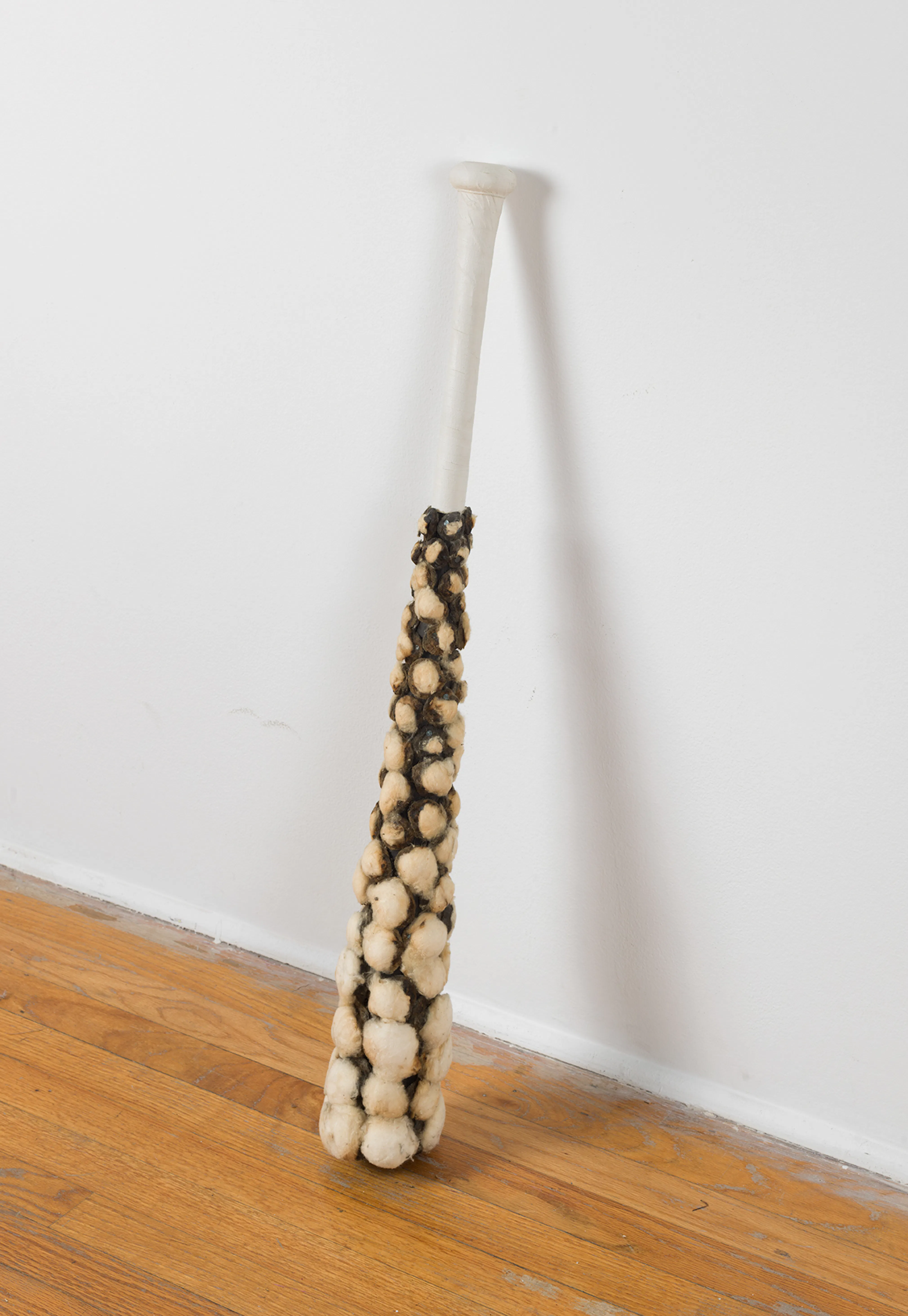 <p>Nari Ward, <em>All Stars</em>, 1995–96. Baseball bat, ironed cotton, nails, medical tape, and sugar, 33 1/2 × 5 × 5 in. Edition 12 of 25. The Studio Museum in Harlem; gift of the artist 1997.1. Photo: Marc Bernier</p>