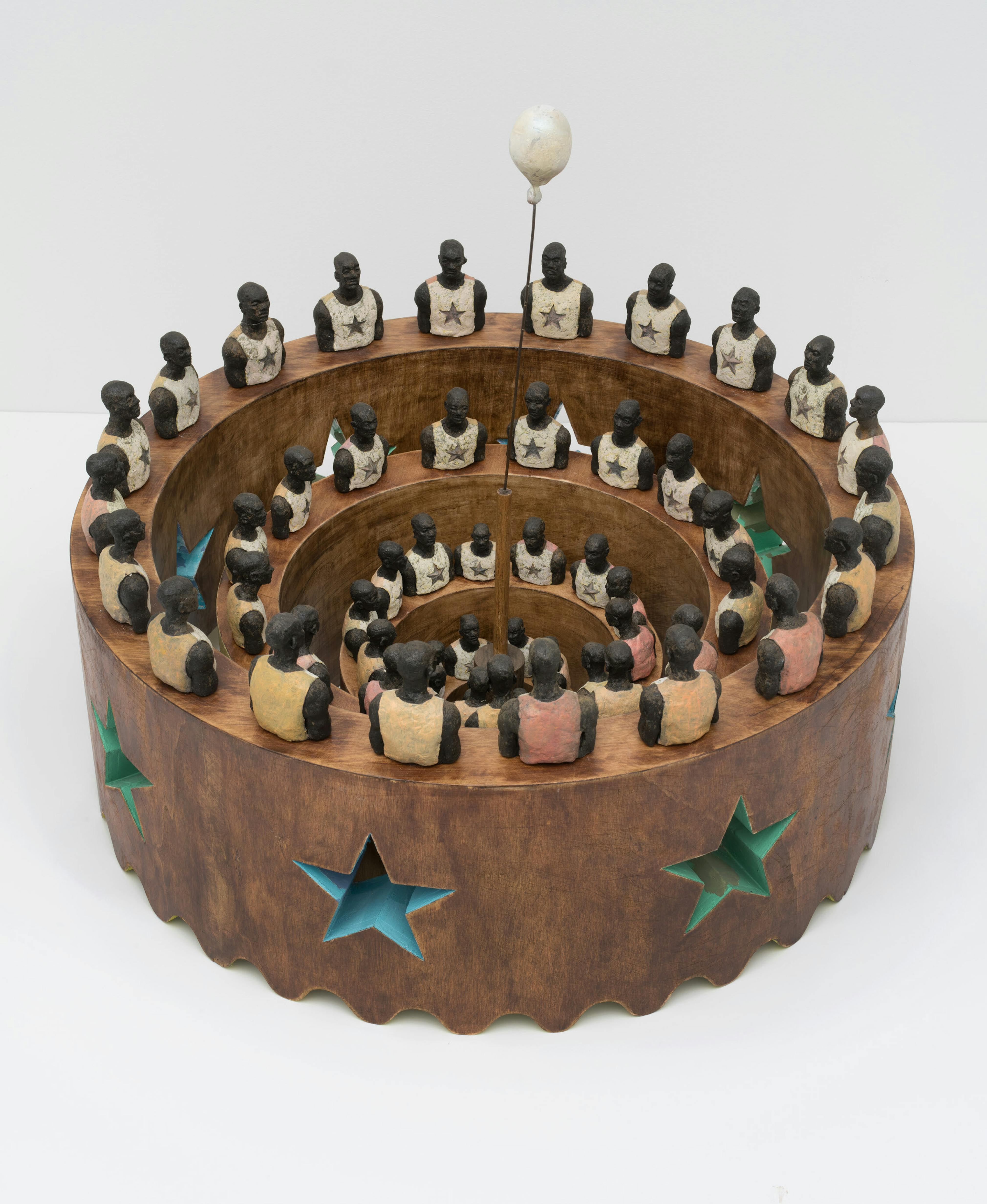 <p>Derek Fordjour, <em>Huddle</em>, 2014. Wood, terracotta, glass, acrylic, and vinyl paint, 20 × 28 × 28 in. Studio Museum in Harlem; Bequest of Peggy Cooper Cafritz (1947–2018), Washington DC, Collector, Educator, and Activist  2018.40.85; Photo: John Berens</p>