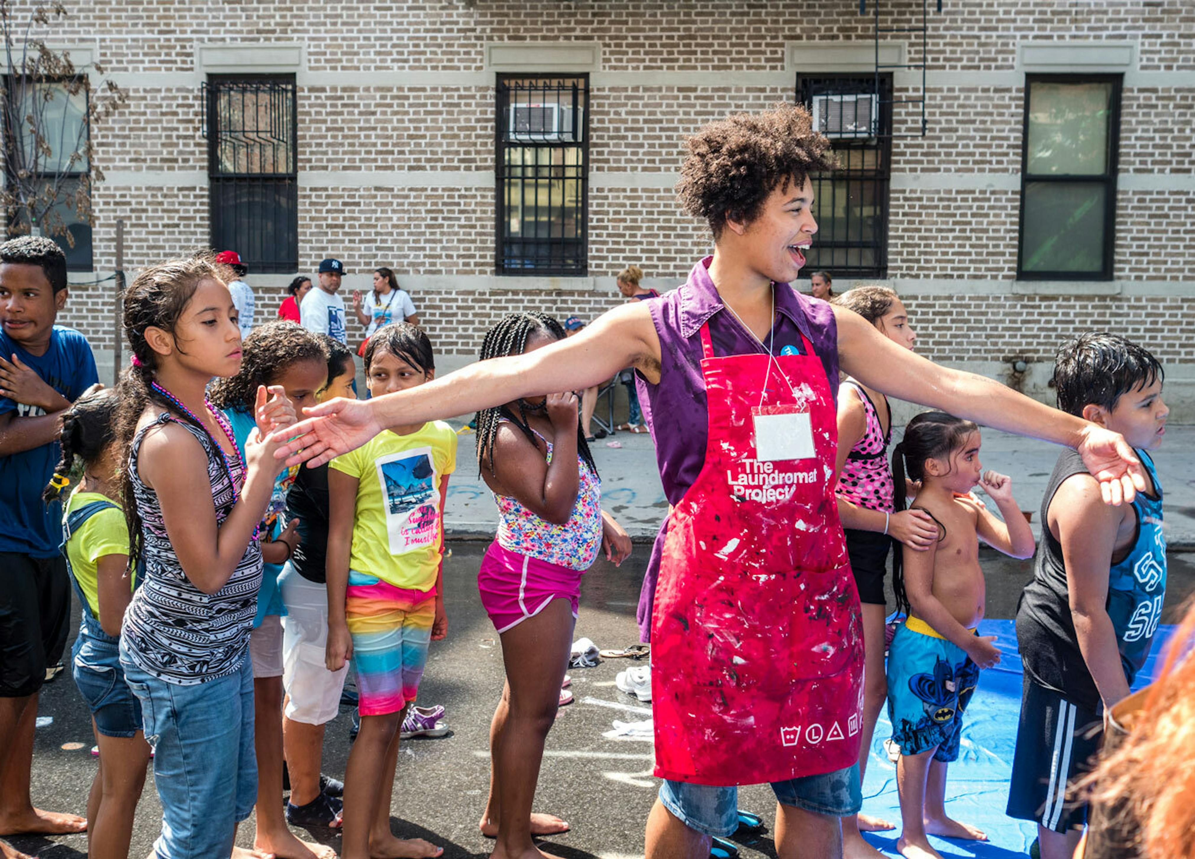 The Laundromat Project Create Change Fellow Nikomeh Anderson facilitates activities during the 2017 Kelly Street Annual Block Party. Photo: Osjua Newton; Courtesy of The Laundromat Project.