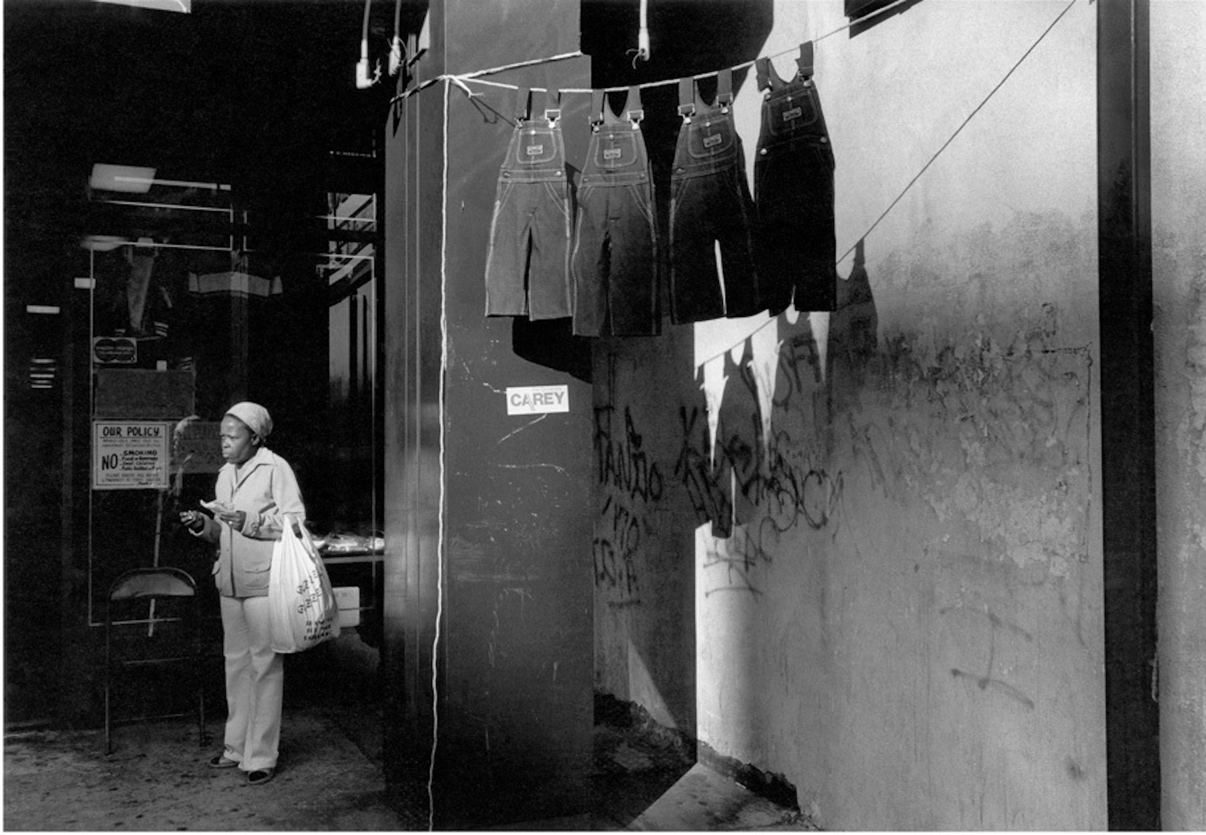 Dawoud Bey
	A Woman with Hanging Overalls, 1978
	Silver print
	Gift of the artist 79.1.1 
